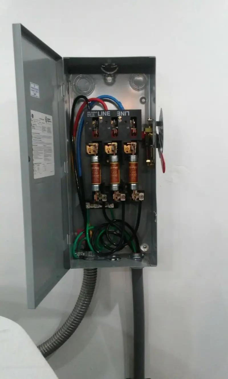 Three-phase disconnect switch installed for Smoke Detector Installation in Jersey Village